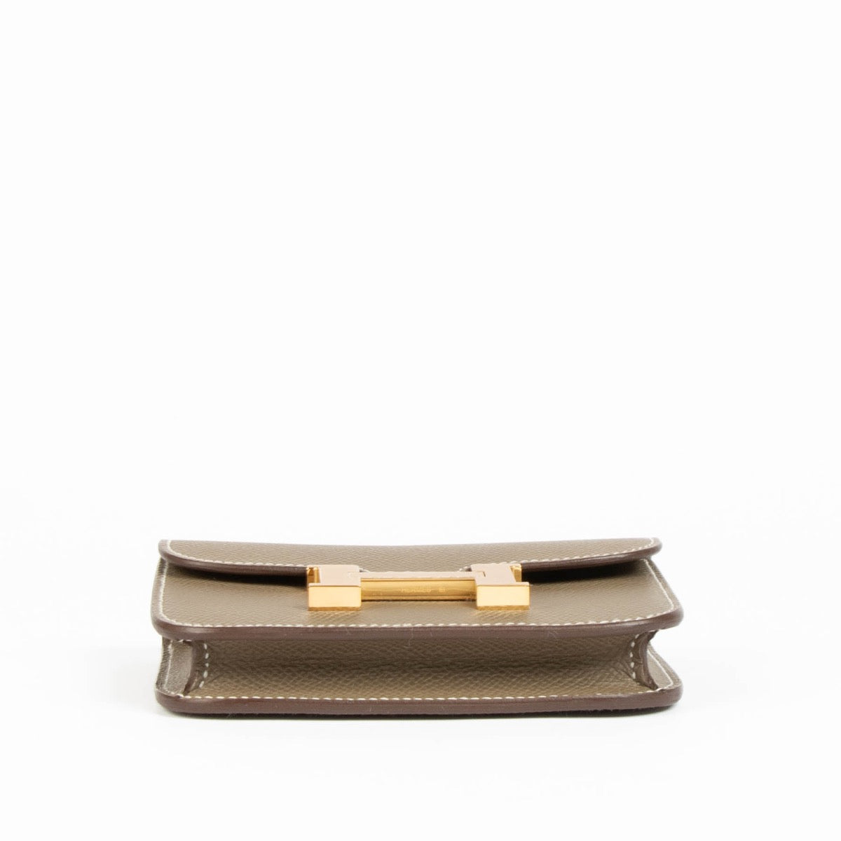 Shop this 100% authentic Hermès Constance Slim Wallet Etoupe Epsom GHW at Labellov.com