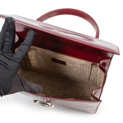 Shop safe online authentic second hand Cartier Burgundy Leather Top Handle Bag. Buy Cartier Burgundy Leather Top Handle Bag in a safe way online. Shop online Cartier Burgundy Leather Top Handle Bag safely.