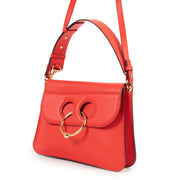 Veilig online kopen van authentieke JW Anderson rode Pierce handtas.