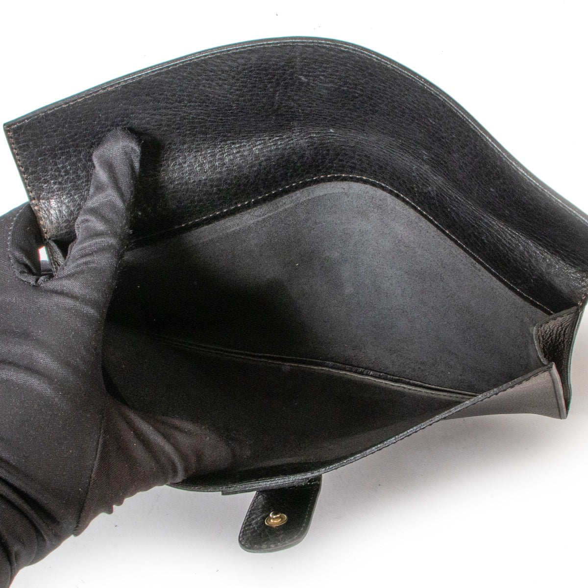 Achetez en ligne ce Clutch Delvaux en cuir noir chez labellov.Com.