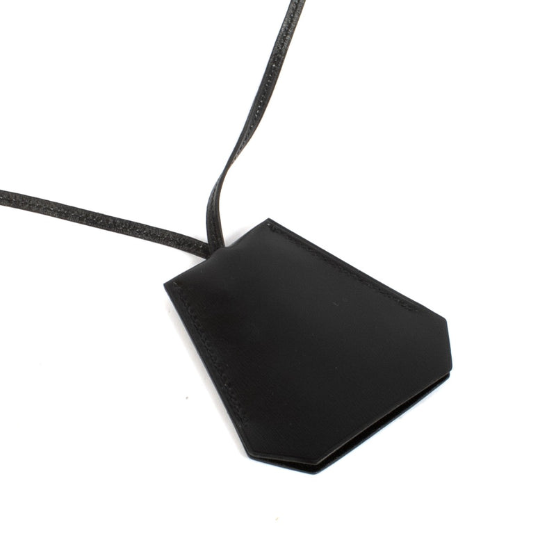 Shop safe online at Labellov in Antwerp, Brussels and Knokke this 100% authentic second hand Hermès Black Margiela Clochette Keyring Necklace
