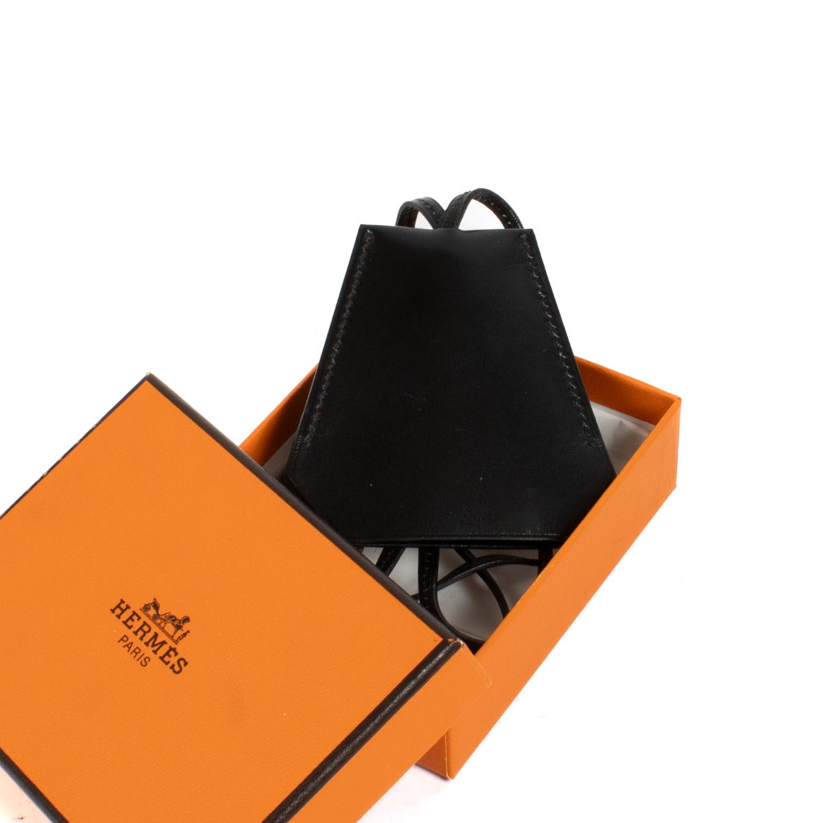 Shop safe online at Labellov in Antwerp, Brussels and Knokke this 100% authentic second hand Hermès Black Margiela Clochette Keyring Necklace