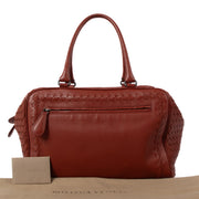 shop 100% authentic second hand Bottega Veneta Red Intrecciato Top Handle Bag on Labellov.com