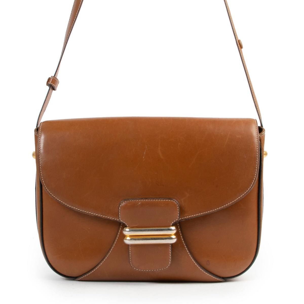 Buy in very good condition a Delvaux Cognac Leather Crossbody.