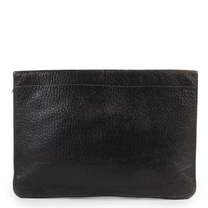 Shop safe online an authentic second hand Delvaux clutch at the right price at Labellov.com.