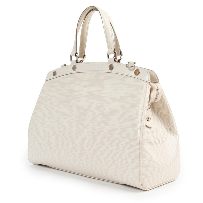 Louis Vuitton White Brea Epi Leather Top Handle Bag for the best price at Labellov secondhand luxury in Antwerp