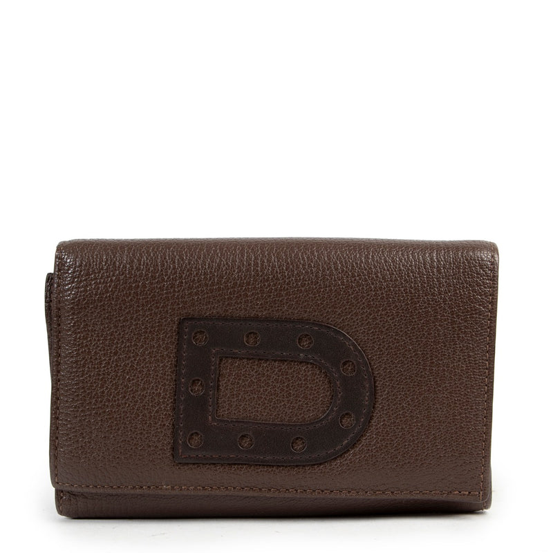 Buy in very good condition a Delvaux Brown Leather Wallet.