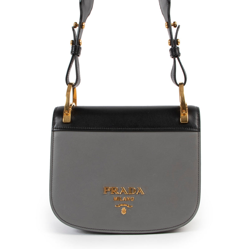 Prada Two-Tone City Calf Pionniere Saddle Bag for the best price at Labellov secondhand luxury in Antwerp