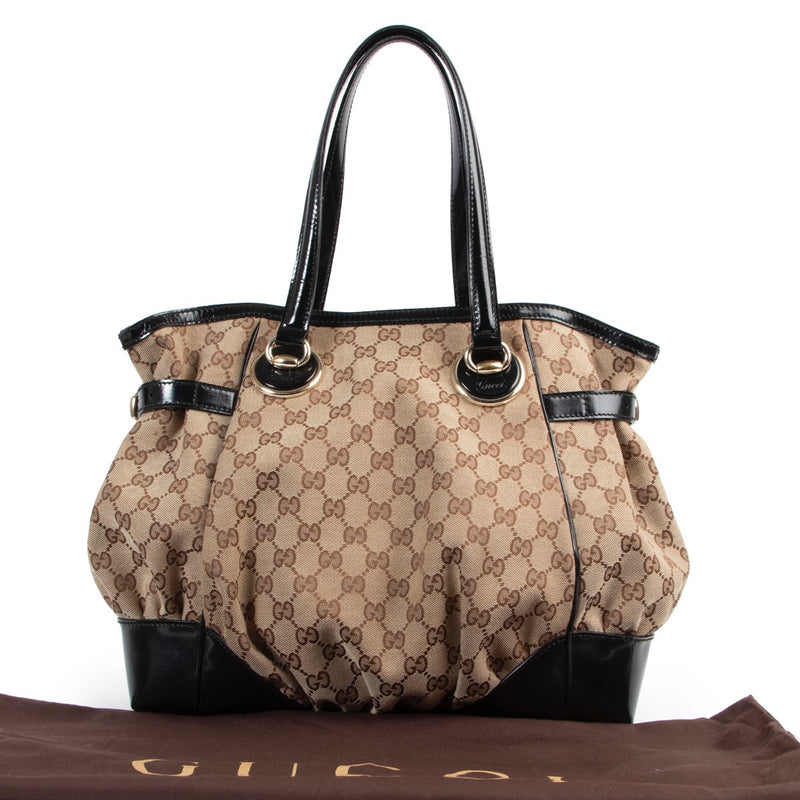 Shop safe online authentic second hand Gucci Monogram Shoulder Bag. Buy online Gucci Monogram Shoulder Bag in a safe way. Shop Gucci Monogram Shoulder Bag online safely.