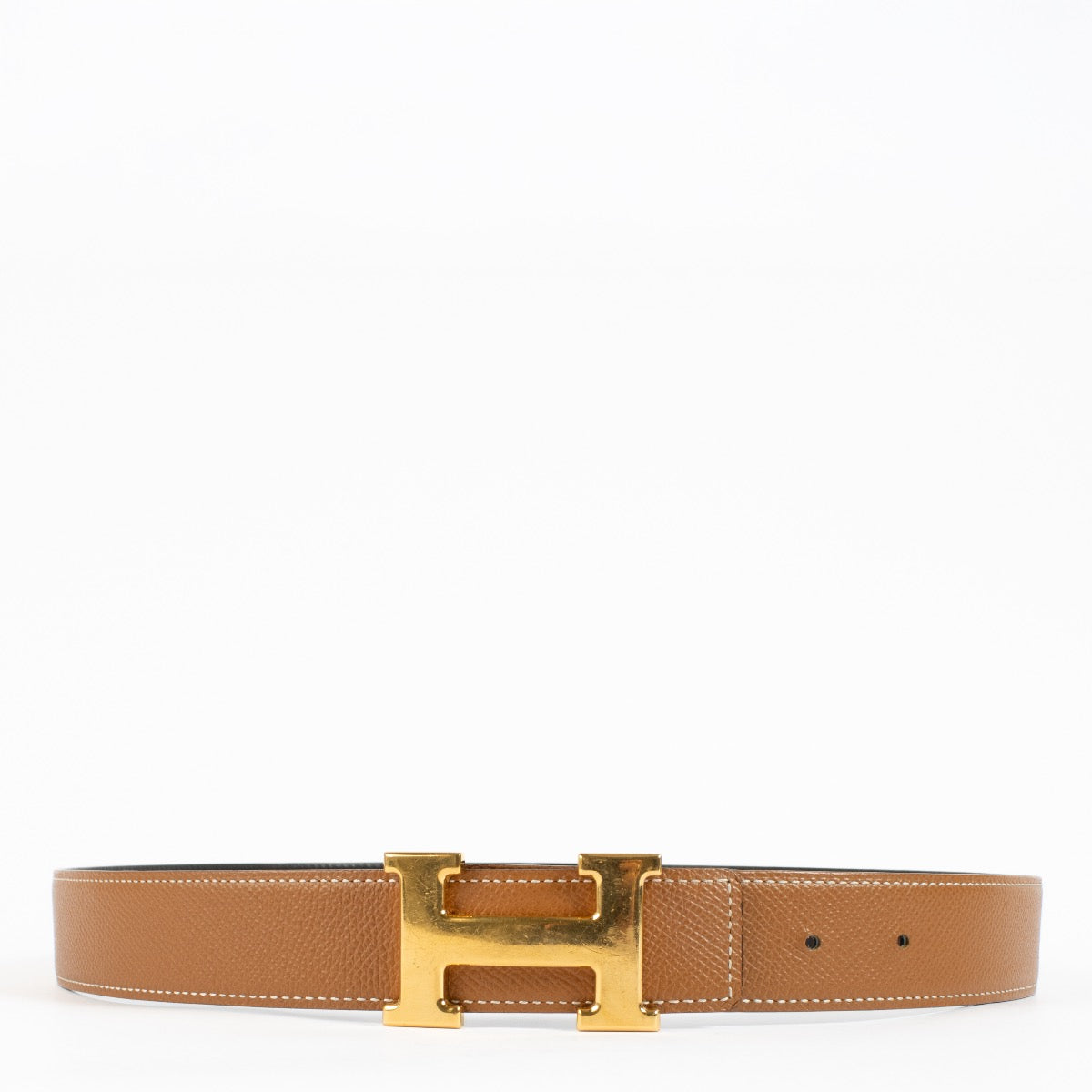Shop safe online at Labellov in Antwerp, Brussels and knokke this 100% authentic second hand Hermès Gold/Noir Epsom/Swift Reversible Constance Belt - size 85