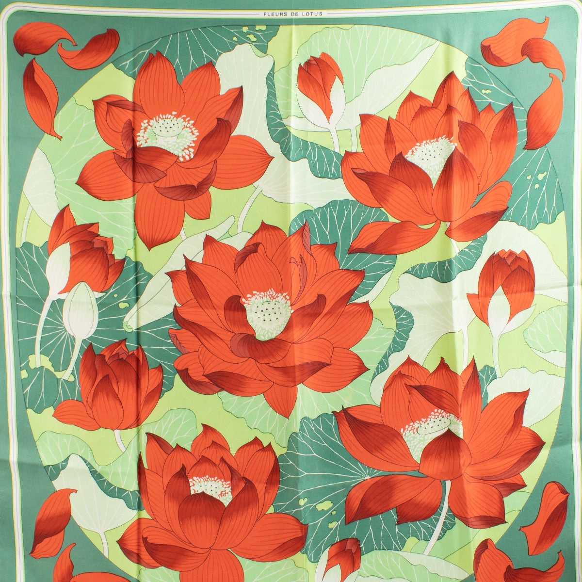 Shop safe online at Labellov in Antwerp, Brussels and Knokke this 100% authentic second hand Hermès Green Fleurs De Lotus Silk Carrée 90 Scarf