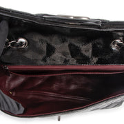 Shop safe online at Labellov in Antwerp this 100% authentic second hand Chanel Black Patent Leather Single Classic Flap Bag