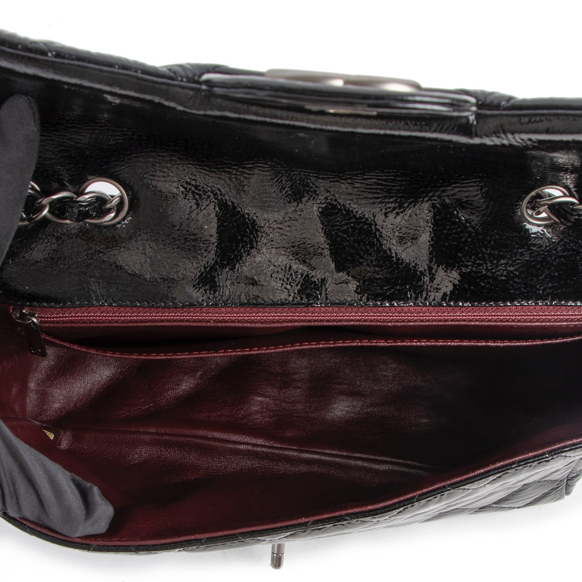 Shop safe online at Labellov in Antwerp this 100% authentic second hand Chanel Black Patent Leather Single Classic Flap Bag