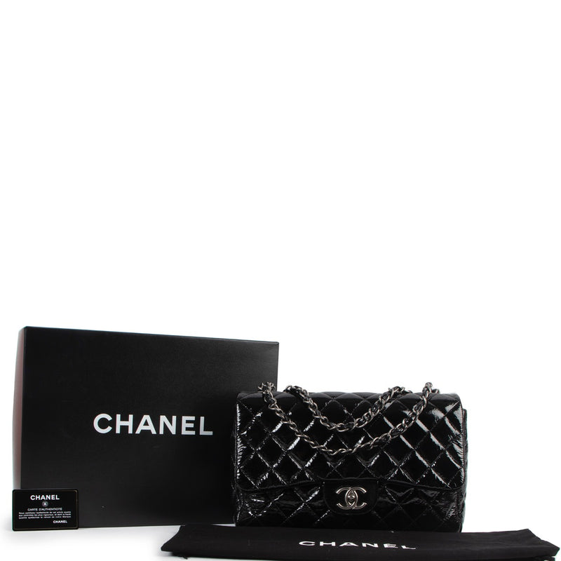 Shop safe online at Labellov in Antwerp this 100% authentic second hand Chanel Black Patent Leather Single Classic Flap Bag