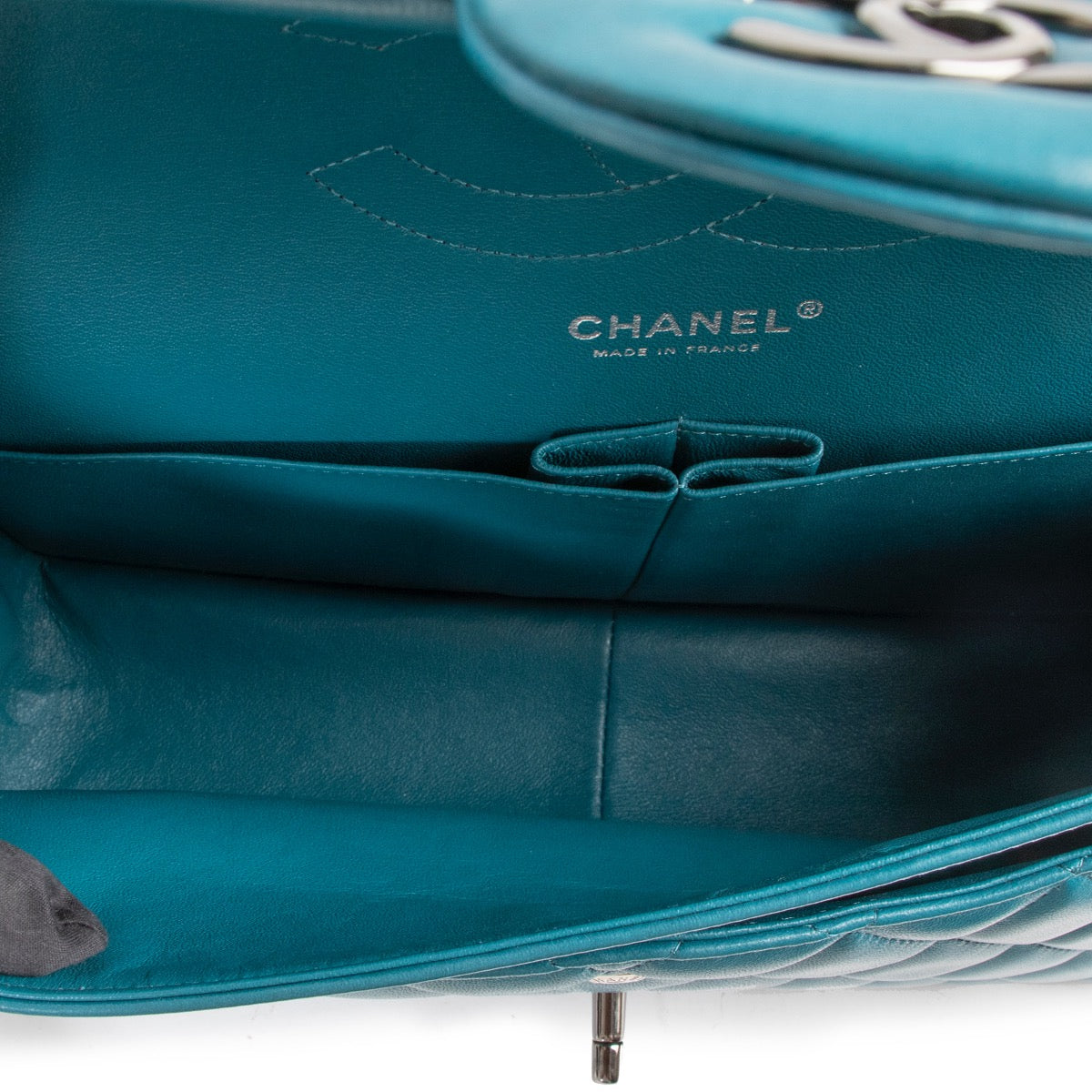 Shop safe online at Labellov in Antwerp this 100% authentic second hand Chanel Teal Quilted Lambskin Leather Jumbo Classic Double Flap Bag