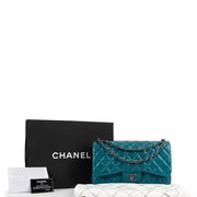 Shop safe online at Labellov in Antwerp this 100% authentic second hand Chanel Teal Quilted Lambskin Leather Jumbo Classic Double Flap Bag