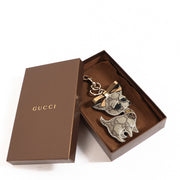 Shop safe online at Labellov in Antwerp this 100% authentic second hand Gucci GG Supreme Guccioli Brando Chihuahua Keychain Charm