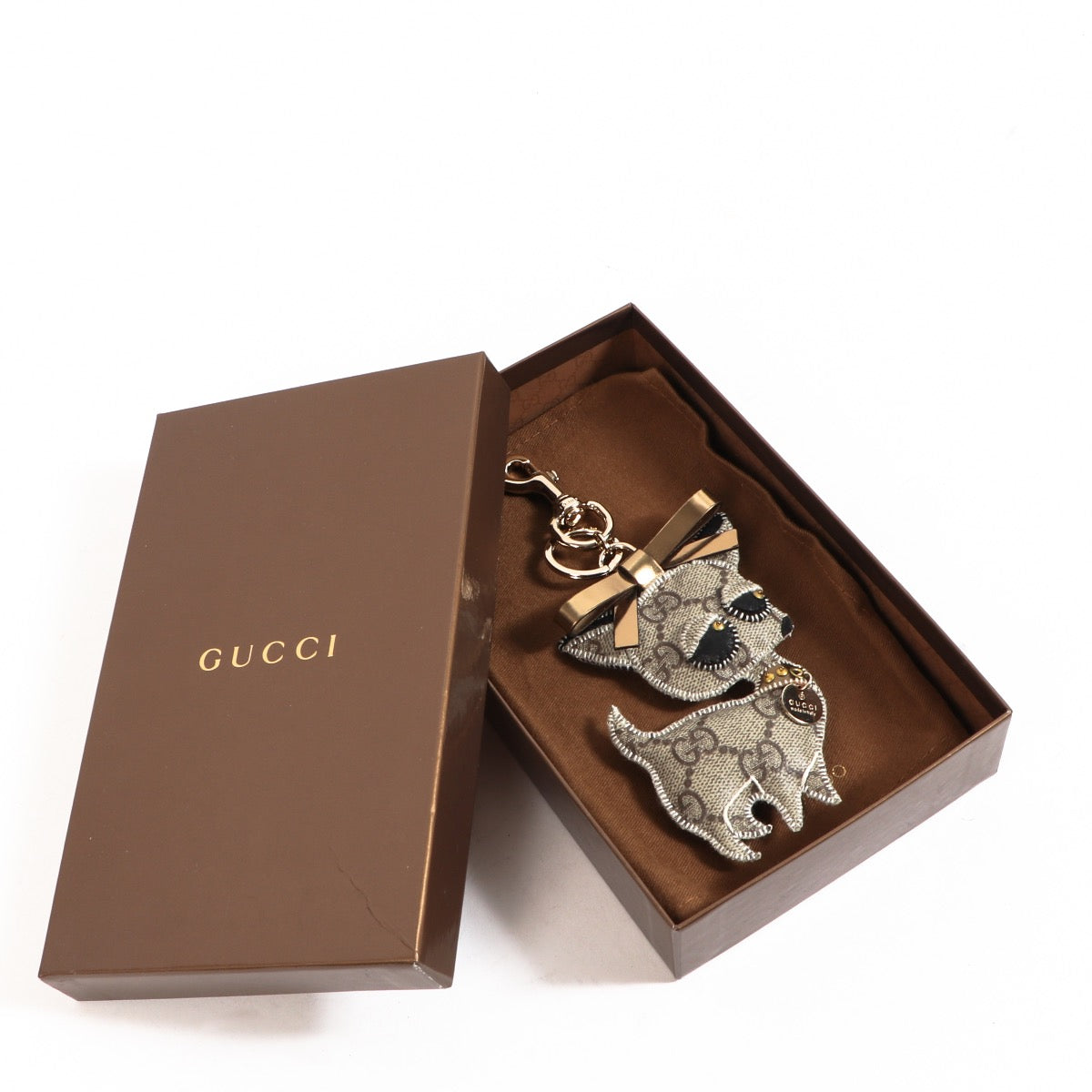 Shop safe online at Labellov in Antwerp this 100% authentic second hand Gucci GG Supreme Guccioli Brando Chihuahua Keychain Charm