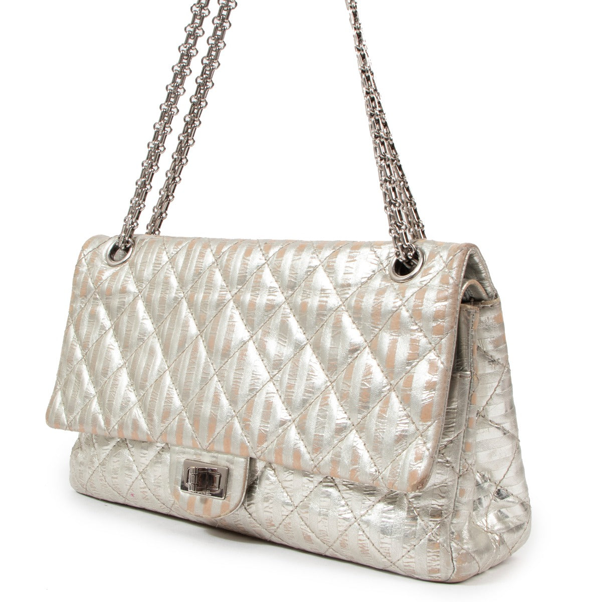 Buy an authentic second hand Chanel Silver Striped Quilted Leather Reissue 2.55 Classic 227 Flap Bag in good condition at Labellov in Antwerp.