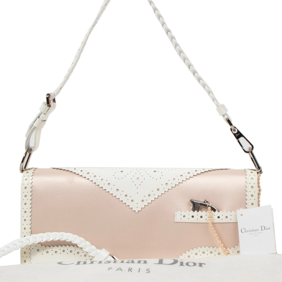 Buy an authentic second hand Christian Dior Pink And White Patent Leather D'Trick Shoulder Bag in very good condition at Labellov Antwerp.