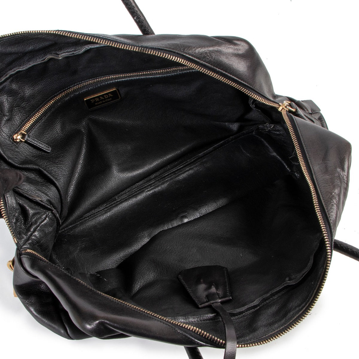 Buy Prada in an authentic way on Labellov.