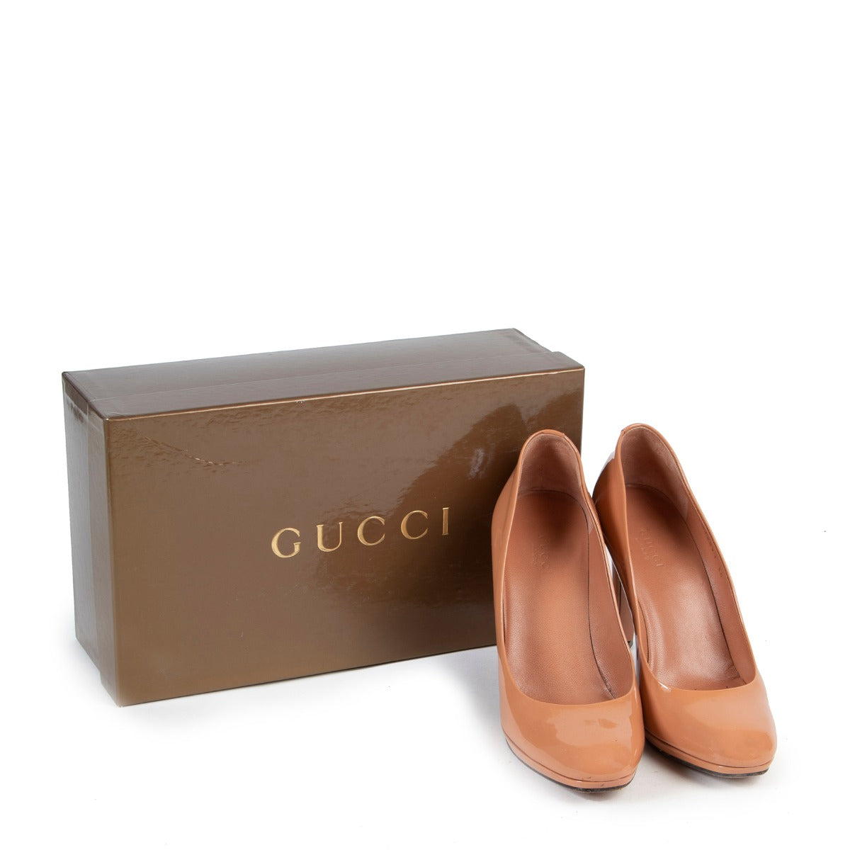 The Gucci Nude Patent Leather Pumps secondhanded in very good condition