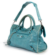 buy and sell your authentic designer Balenciaga Classic City Bleu Paon RHW for the best price online at Labellov. We buy and sell your bags online and in Antwerp.