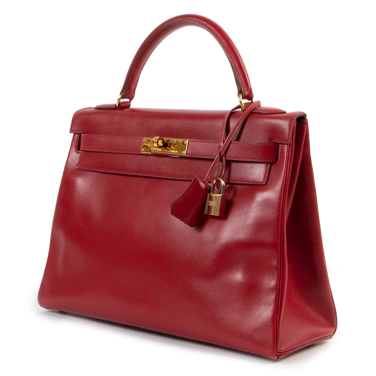 Shop safe online 100% authentic second hand Hermès Kelly Retourne 32 Smooth Red Veau Tadelakt Calfskin GHW at Labellov in Antwerp.