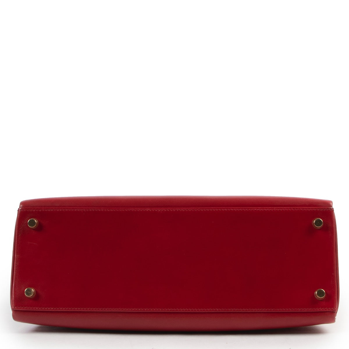 Shop safe online 100% authentic second hand Hermès Kelly Retourne 32 Smooth Red Veau Tadelakt Calfskin GHW at Labellov in Antwerp.