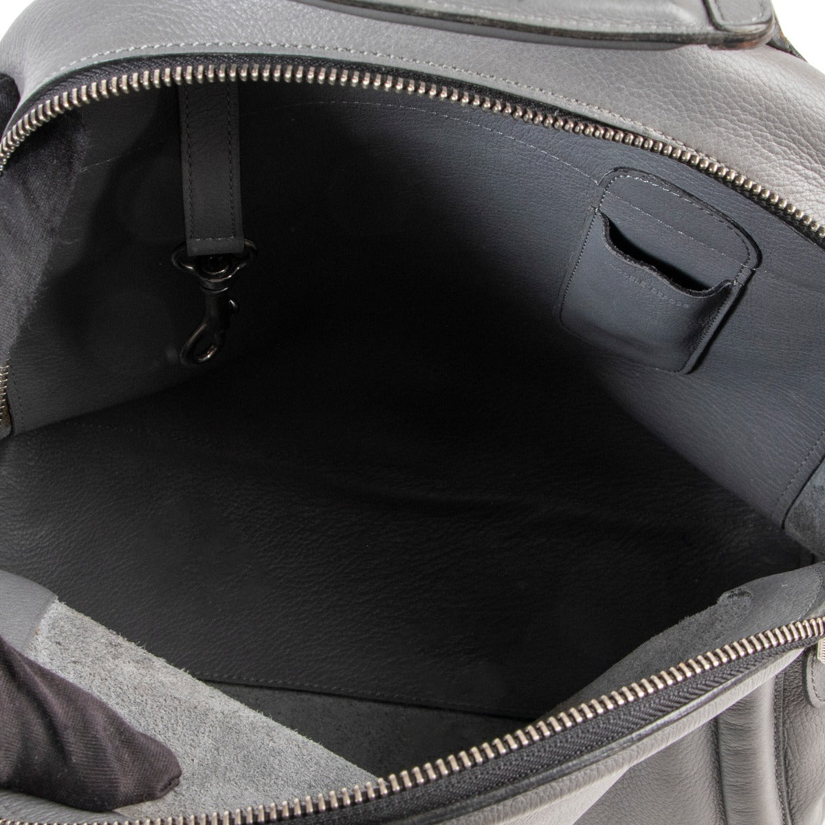 Beautiful backpack in grey colours by Delvaux couture with extra key hanger on Labellov site