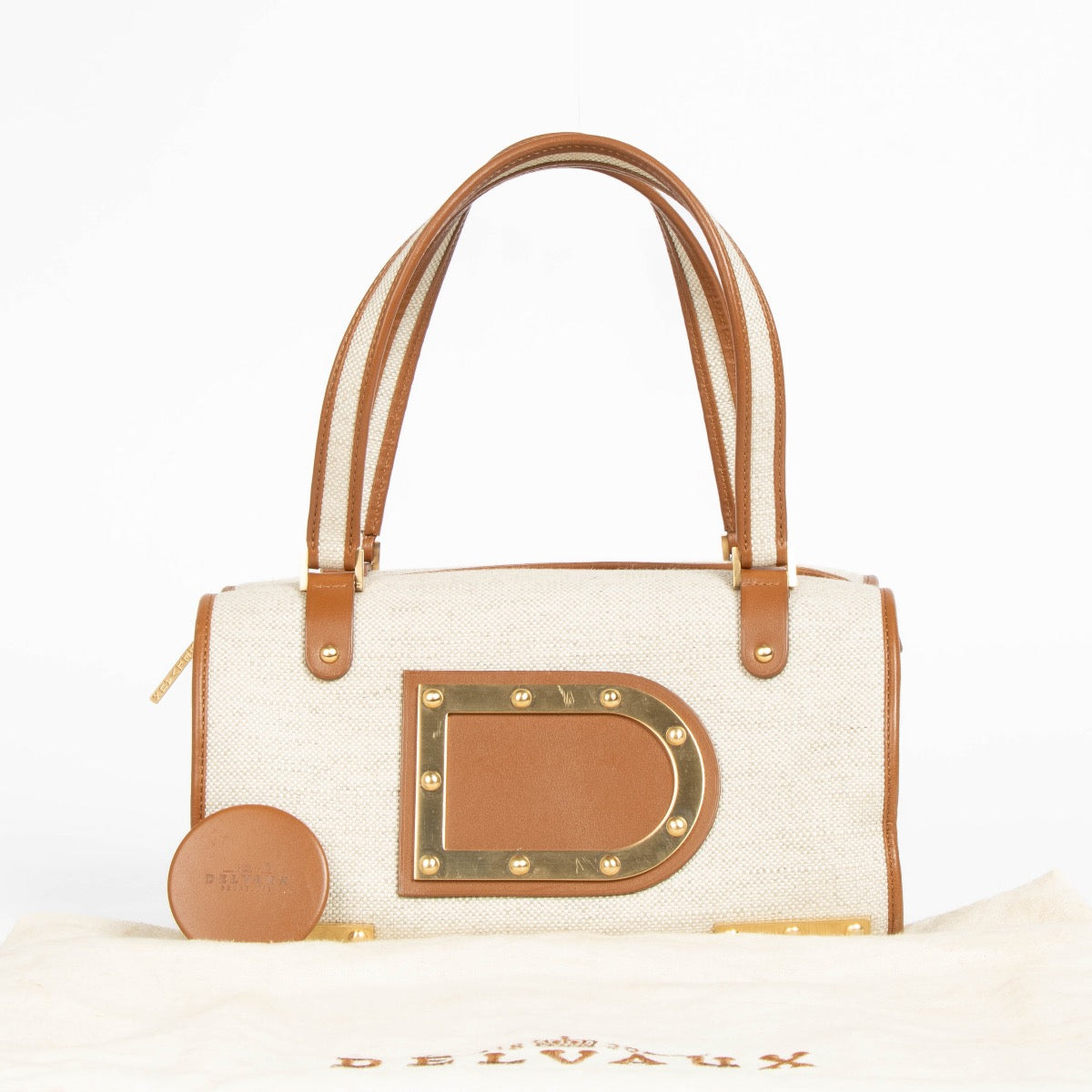 Authentic pre-loved Delvaux Beige Le Astrid MM Bag on Labellov.com