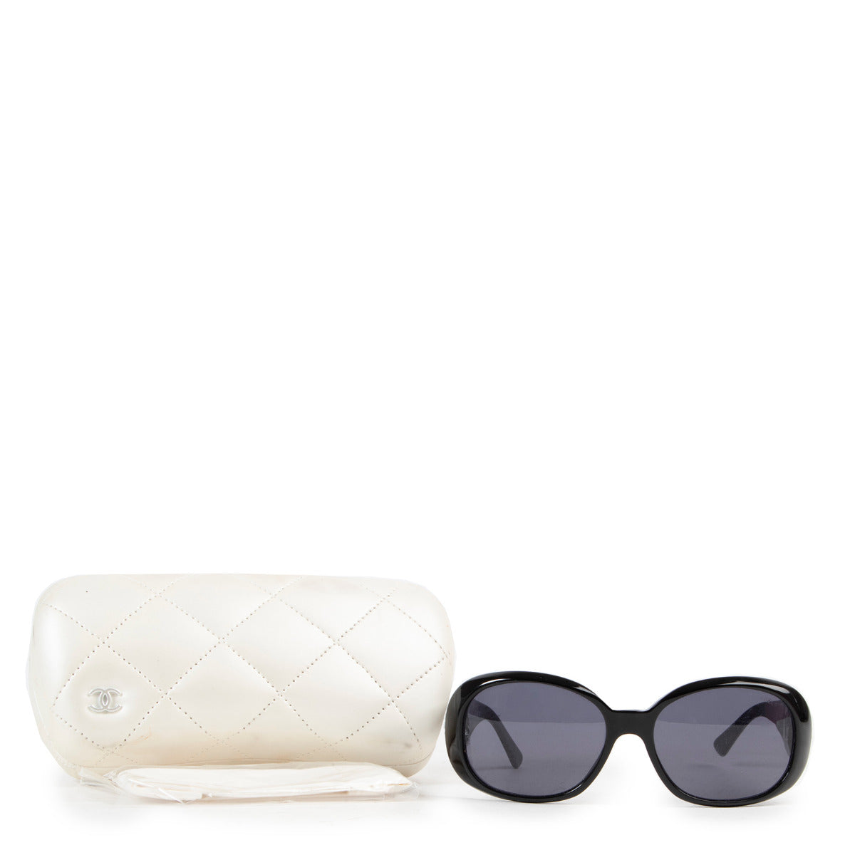 Lunettes de soleil Chanel noires Camélia