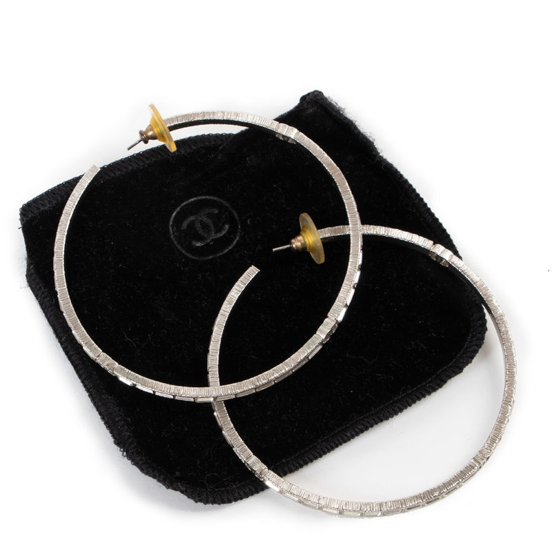 Shop authentic luxury designer vintage Chanel Silver Crystal Hoop Earrings at Labellov