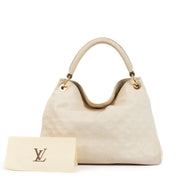 Shop 100% authentic second-hand Louis Vuitton White Monogram Empreinte Artsy MM Shoulder Bag on Labellov.com