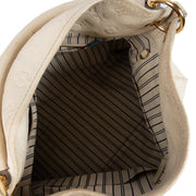 Shop 100% authentic second-hand Louis Vuitton White Monogram Empreinte Artsy MM Shoulder Bag on Labellov.com