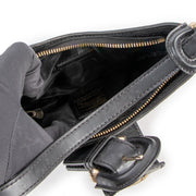 Buy online an authentic second hand Burberry black quilted mini shoulder bag in good condition at Labellov in Antwerp.