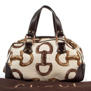 Buy online an authentic second hand Gucci Horsebit Canvas Bamboo Boston bag in very good condition at Labellov in Antwerp.
