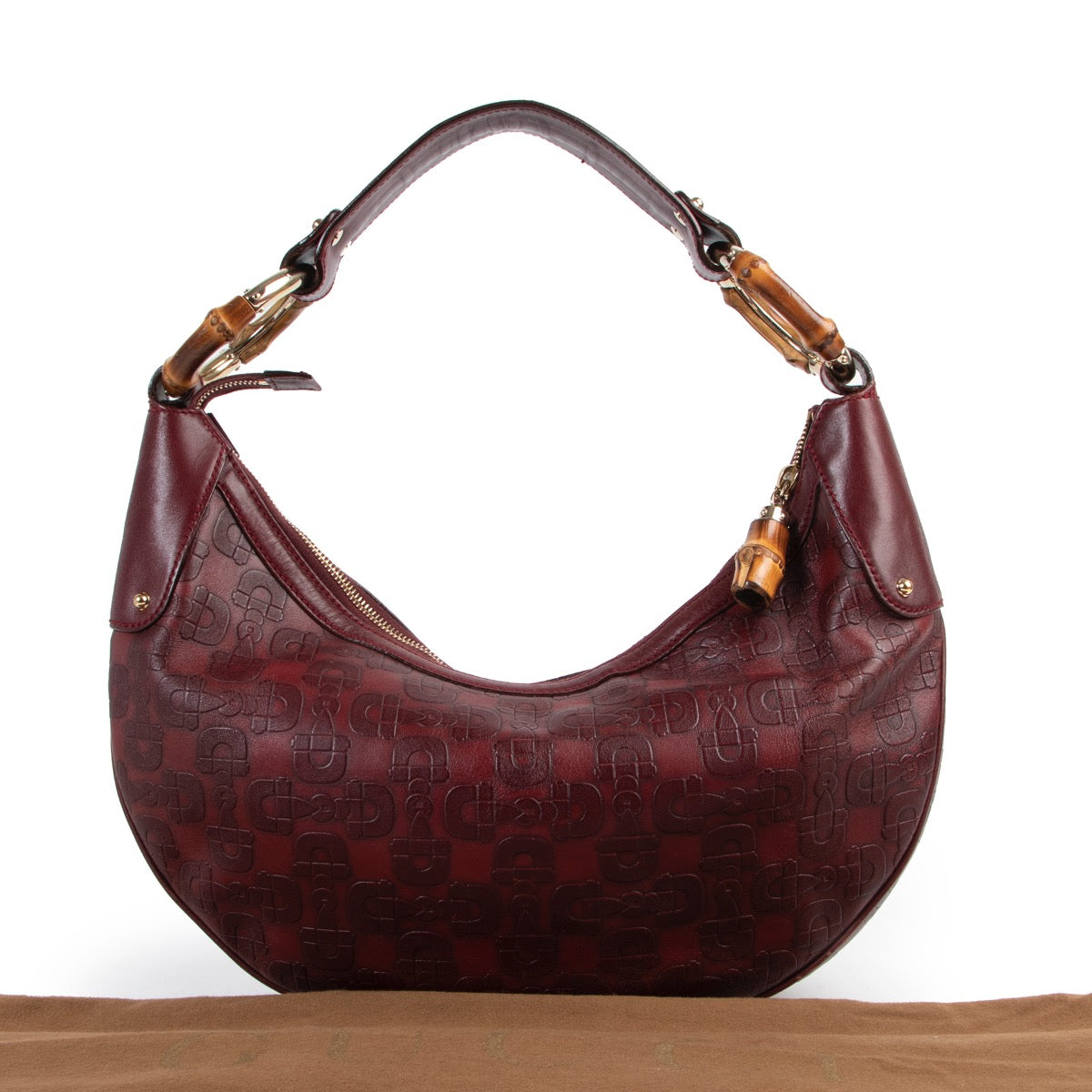 Shop safe online or in store at Labellov for a reasonable price of designer items. This Gucci Burgundy Horsebit Bamboo Ring Moon Hobo Bag is available at Labellov.
