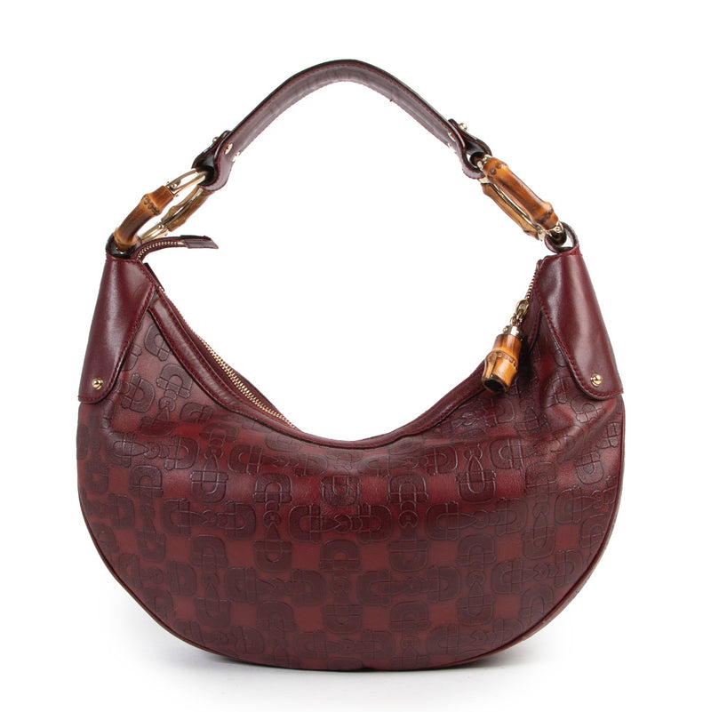 Shop safe online or in store at Labellov for a reasonable price of designer items. This Gucci Burgundy Horsebit Bamboo Ring Moon Hobo Bag is available at Labellov.