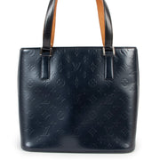 Buy an authentic second hand Louis Vuitton Stockton Blue Monogram Mat Bag in very good condition at Labellov in Antwerp.