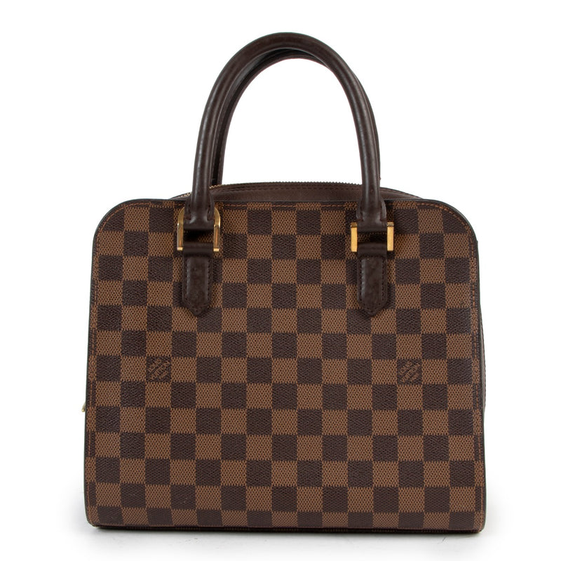 Buy an authentic second hand Louis Vuitton Damier Ebene Triana Top Handle Bag in very good condition at Labellov in Antwerp.