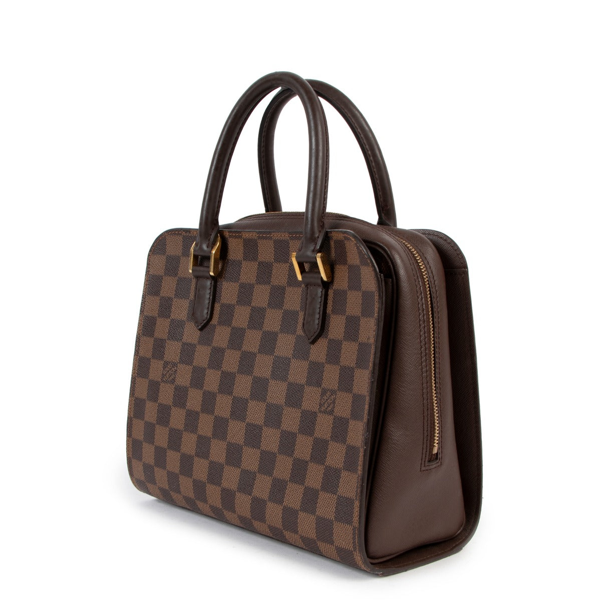 Buy an authentic second hand Louis Vuitton Damier Ebene Triana Top Handle Bag in very good condition at Labellov in Antwerp.