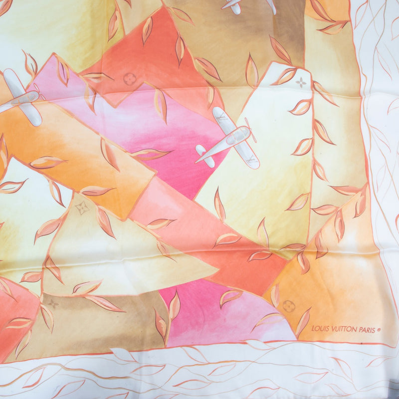 Buy and sell your authentic designer accessories such as this Louis Vuitton Pink Orange Airplane Scarf only at Labellov secondhand luxury in Antwerp.