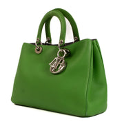 Christian Dior Green Diorissimo Medium Bag for the best price at Labellov secondhand luxury in Antwerp. We buy and sell your preloved and brand new designer bags for the best price.