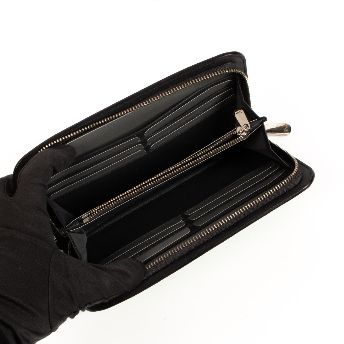 Christian Dior Bamboo Green Zip Around Wallet for the best price at Labellov. We buy and sell your authentic designer bags for the best price. Are you looking for an authentic designer piece? Shop at Labellov.