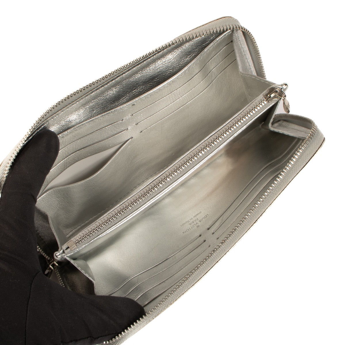 Shop 100% authentic second-hand Louis Vuitton Silver Suhali Zippy Wallet on Labellov.com