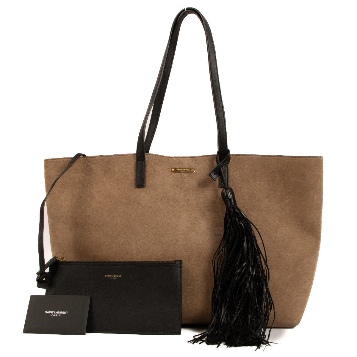 This authentic preloved Saint Laurent Beige Suede East/West Tassel Shoulder Bag comes with a pouch