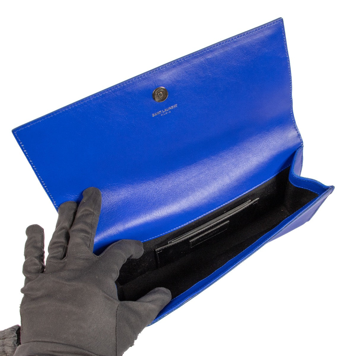 Saint Laurent Electric Blue Kate Clutch for the best price at Labellov secondhand luxury in Antwerp. We buy and sell your preloved and brand new designer bags for the best price.