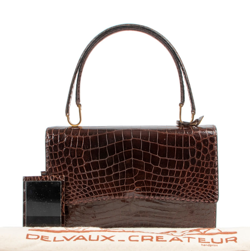 Shop safe online Delvaux Brown Crocodile Top handle for the best price. shop safe online your secondhand Delvaux Brown Crocodile Top handle. Buy authentic secondhand Delvaux bags at Labellov vintage fashion webshop for the lowest price. Koop authentieke