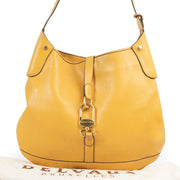 Vintage leather bag by Delvaux with gold metallic details